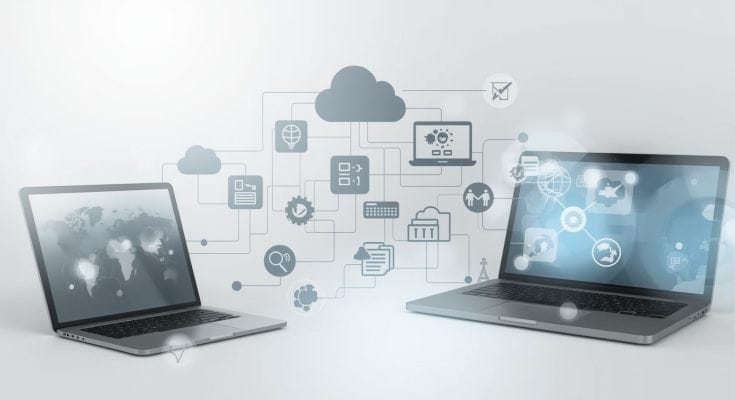 A conceptual 3D illustration of two laptops connected to cloud computing and digital icons, representing technology as a tool for connectivity and information sharing.